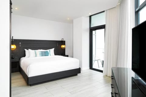 Wake to sunlit serenity and step onto your private balcony.