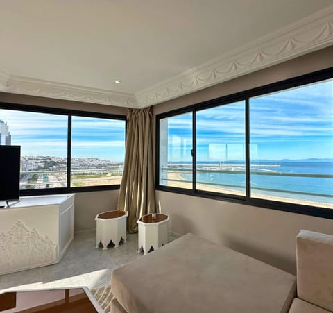 Living Room with Smart TV and Ocean View