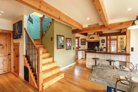 Heading Upstairs - Beautiful Wood Floors and Exposed Beams