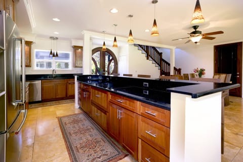 Expansive countertops provide plenty of space for meal preparation.