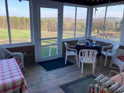 Screened in porch with views from three sides