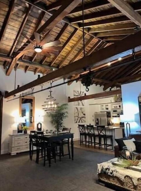 The large open concept gathering area was formerly a hayloft in this 1860 stable