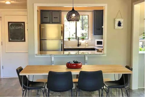 Dining area and kitchen pass through are open and gorgeous.