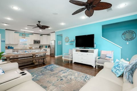 Open concept with huge table for meals and games!