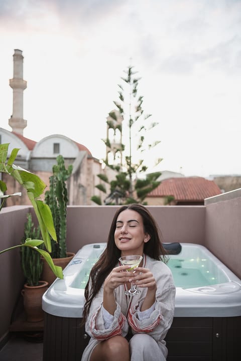 Sunset glow from your private jacuzzi—end your perfect Cretan day in style.