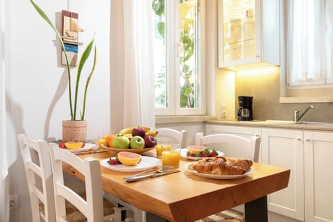 "Gather around our artisanal wooden table, where every meal becomes a cherished moment shared among loved ones."