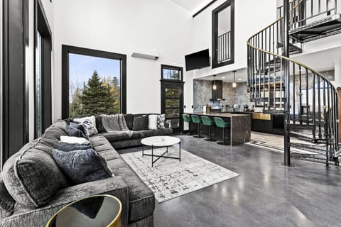 Main living area, with bedroom lofts above.