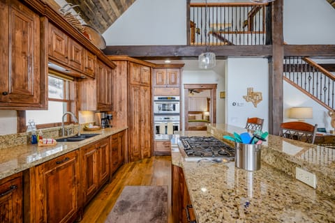 Discover comfort and convenience in our stylish kitchen, fully equipped with all the essential tools you need for effortless cooking.