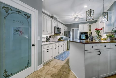 This spacious kitchen is fully equipped.