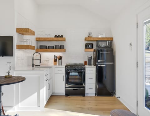 Fully functional kitchen with oven/stovetop, fridge, microwaves and K-cup coffee maker