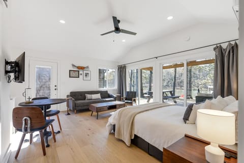 Open concept living/sleeping area with smart tv perfect for a cozy getaway