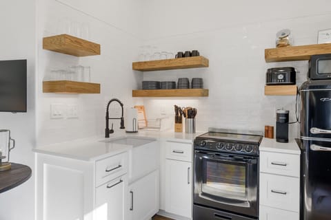 Fully functional kitchen with oven/stovetop, fridge, microwaves and K-cup coffee maker