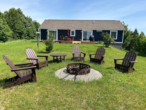 Outdoors - 3+ private acres, deck, outdoor chairs, gas grill, fire pit, corn hole.