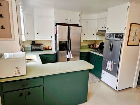 Kitchen with functioning antique oven and stove