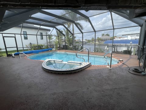 Lanai and Pool, canal view