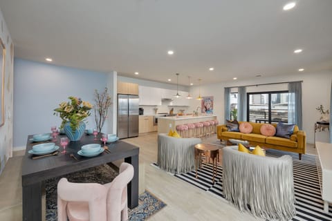 Open & bright Dolly Parton themed living area featuring modern designer furnishings.