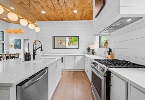 Soak up the light in our open-concept living space, where every window frames the beauty of nature