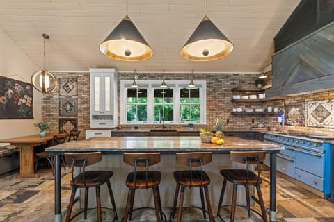 Fully Stocked Kitchen with Bar Seating