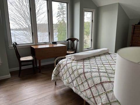 The bedroom with beautiful views out to the river