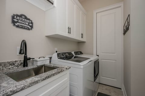 Laundry Room with full size washer and dryer