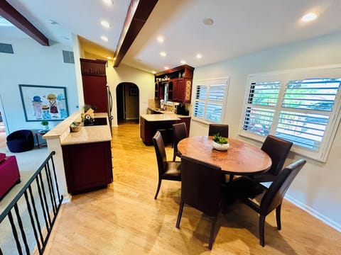 Dining/Kitchen overlooks Family Room