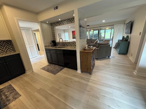 View from kitchen to Living area and porch