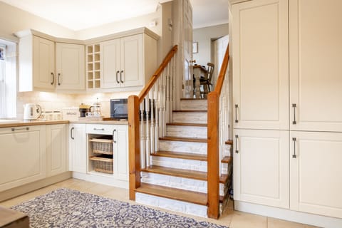 Lower ground floor: The cottage kitchen boasts plenty of storage