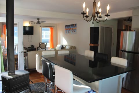 view from kitchen island into living area 