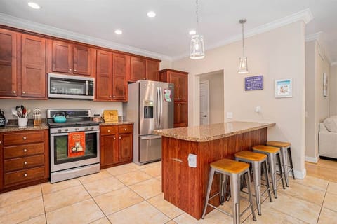 Every Moment is Shared, and Every Meal is Savored with Our Home`s Convenient Kitchen Peninsula