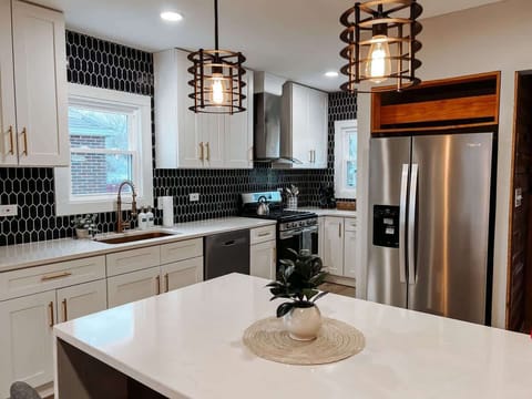 Whip up culinary delights in our modern, fully-equipped kitchen.