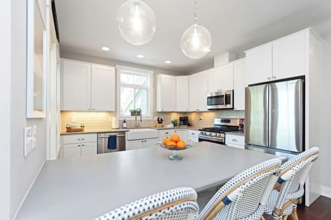 Bright modern gourmet kitchen equipped with all you need