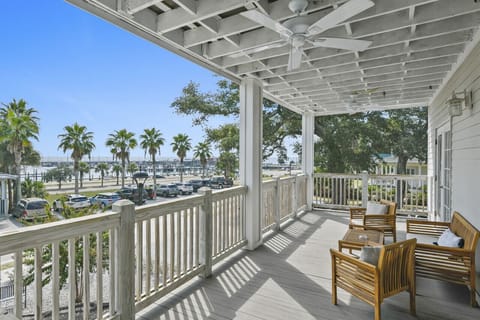 Step onto your private balcony and take in sweeping harbor views, framed by swaying palms and the charm of coastal Mississippi.