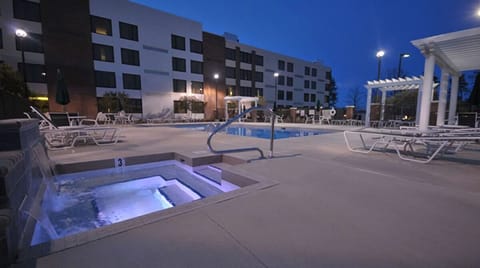 Slip into the bubbling hot tub for soothing evening recovery.