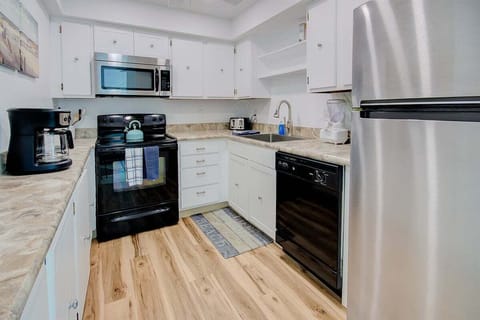 Full kitchen with stainless steel appliances