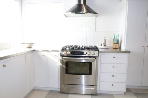 Range with gas stovetop and electric oven