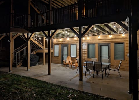 Back patio nicely lit at night for evening relaxation!