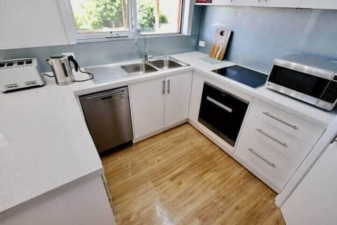 Enjoy the Miele appliances including the cute dishwasher, induction cooktop and the pyrolytic oven. New Breville jug and 4-slice toaster. All manuals for appliances are in cupboard above cooktop. There is also an extraction fan above cooktop.