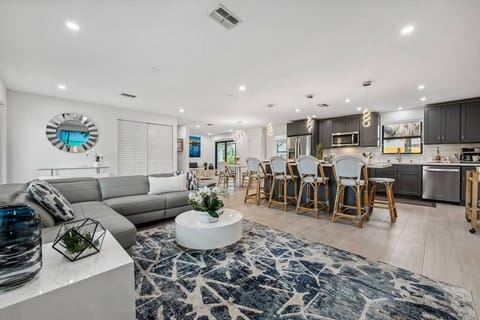 The beauty of an open floor plan, where spaces flow effortlessly into one another, creating a sense of spaciousness and togetherness.