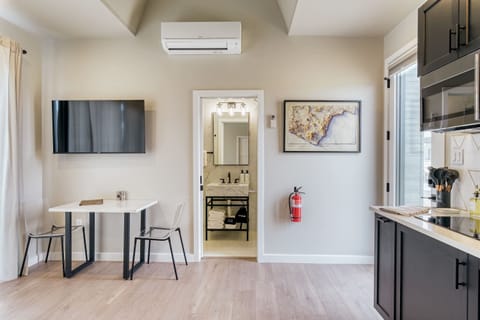 Dining Table and workstation. 4K Smart TV with Netflix, Hulu, HBO, YouTube, and other apps