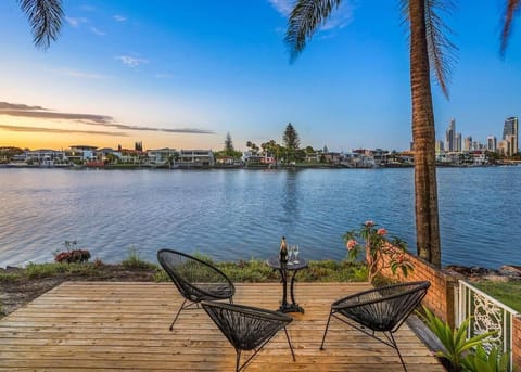 The back deck is comfortably furnished for casual alfresco dining while you take in breathtaking views of the Nerang River. 
