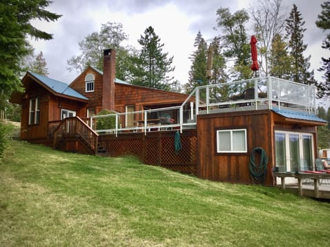 South side of home showing upper and lower decks.