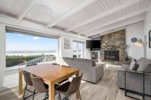 Welcome to Moonstruck Beach House, a stunning oceanfront retreat that was beautifully remodeled to offer every luxury you could wish for.