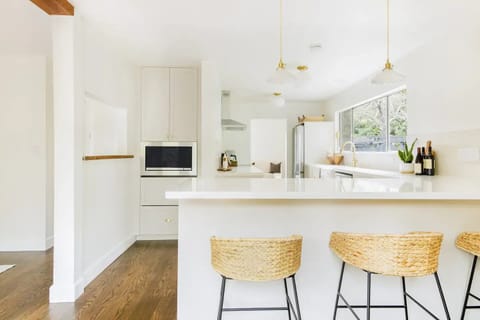 Floor 1, New kitchen with full-size stainless steel appliances & quartz counters