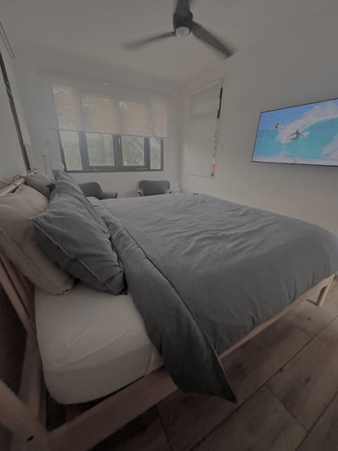 Large window with panoramic ocean view. 50” TV