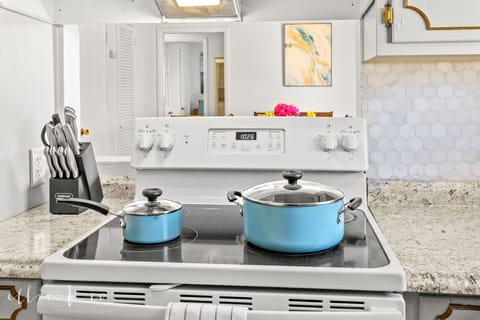 Fully stocked kitchen for cooking and meals.