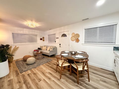 Gather around the table and savor delicious meals in our stylish kitchen/dining area.