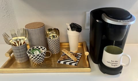 Coffee bar includes single cup or carafe options, K cups, ground coffee, & cream