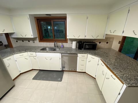 Kitchen with Table Top Microwave and Keurig