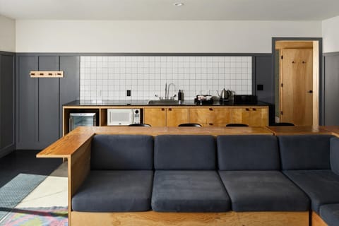 A kitchenette completes the suite along with two bathrooms with showers.