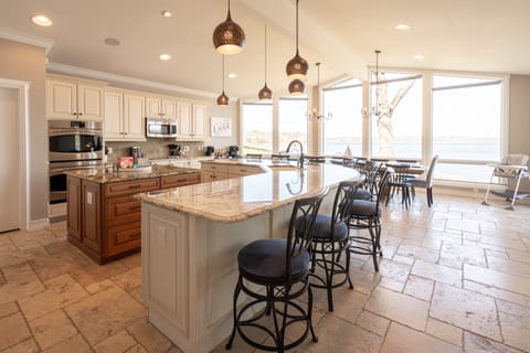 Large kitchen with beautiful views with 
pantry.